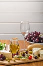 Delicious blue cheese with olives, grapes and salad Royalty Free Stock Photo