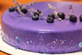 Delicious blueberry cake with blue berries, beads, lavender flower branches