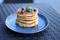 Delicious blueberry pancakes with syrup in a restaurant Royalty Free Stock Photo