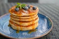 Delicious blueberry pancakes with syrup in a restaurant Royalty Free Stock Photo