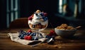 A delicious bowl of yogurt topped with fresh berries on a rustic table. Royalty Free Stock Photo