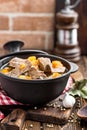 Delicious braised beef meat in broth with vegetables, goulash Royalty Free Stock Photo