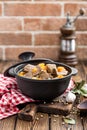 Delicious braised beef meat in broth with vegetables, goulash Royalty Free Stock Photo