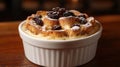 Delicious bread pudding with raisins and icing sugar in a white ramekin Royalty Free Stock Photo