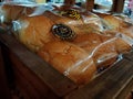 delicious bread on rattan wooden shelf for sale in sakinah supermarket, surabaya