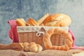 Delicious bread and rolls in wicker basket Royalty Free Stock Photo