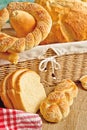 Delicious bread and rolls in wicker basket Royalty Free Stock Photo