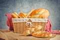 Delicious bread and rolls in wicker basket Royalty Free Stock Photo