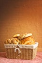 Delicious bread and rolls in wicker basket Royalty Free Stock Photo