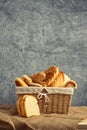 Delicious bread and rolls in wicker basket Royalty Free Stock Photo