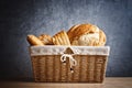 Delicious bread and rolls in wicker basket Royalty Free Stock Photo