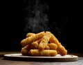 Delicious breaded mozzarella cheese sticks stack with hand with hot smokes Royalty Free Stock Photo