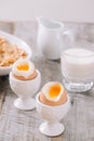 delicious breakfast with boiled eggs and crispy toasts, horizontal, closeup Royalty Free Stock Photo