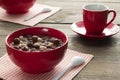 Delicious breakfast of chocolate cereal balls and coffee in a cu Royalty Free Stock Photo