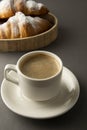 Delicious breakfast coffee with croissant. Morning caffeine. French, fresh pastry and cup of coffee or latte. Caffeine adicted Royalty Free Stock Photo