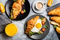 Croissant sandwiches with Fried Egg, Salad Leaves, Grilled Mushr