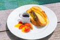 Delicious breakfast with french toasts with fried banana, honey