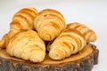 Delicious breakfast with fresh croissants and coffee served with butter and honey Royalty Free Stock Photo