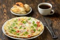 Delicious breakfast omelette with vegetables, croutons and coffee Royalty Free Stock Photo
