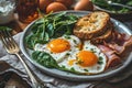 Delicious breakfast plate with sunny side up eggs, toast, and spinach