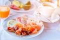 Delicious breakfast served with coffee, orange juice, egg, ham, bacon rolls at the luxury hotel Royalty Free Stock Photo