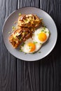 Delicious breakfast of shiitake toasts and fried eggs close-up. Vertical top view Royalty Free Stock Photo