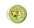 Delicious broccoli cream soup with croutons isolated, top view Royalty Free Stock Photo