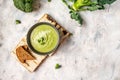 Delicious broccoli cream soup with parmesan cheese and crunchy croutons on white background. Healthy vegetarian food. Vegan menu. Royalty Free Stock Photo