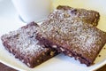 Delicious brownies in a coffee dish