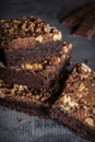 Stack of homemade brownies cake with a lot of walnuts Royalty Free Stock Photo