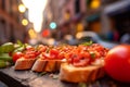 Delicious Bruschetta plate, set against the charming, softly blurred streets of Rome. Royalty Free Stock Photo