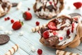 Delicious bubble waffle with ice cream on wooden table