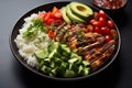 Delicious Buddha bowl grilled chicken, fresh vegetables, and rice top Royalty Free Stock Photo