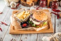 Delicious burger with lamb cutlet and vegetables Royalty Free Stock Photo