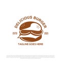 Delicious burger logo design vector, vintage illustration of fast food logo brand Royalty Free Stock Photo