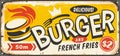 Delicious burger vintage tin sign Royalty Free Stock Photo