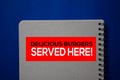 Delicious Burgers Served Here! write on a book isolated on blue background