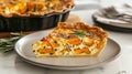 Delicious butternut squash and ricotta quiche slice on ceramic plate Royalty Free Stock Photo