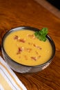 Delicious butternut squash soup with bacon bits Royalty Free Stock Photo