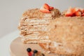 Delicious cake cut. Homemade honey cake. Delicious cakes with honey and berries