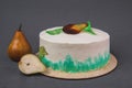 A delicious cake decorated with caramelized pears on a gray background.