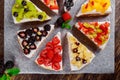 Delicious cake with fresh strawberries, raspberries on the table. top view