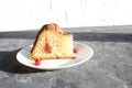 Slices of cake on a plate. Berries of a cherry on a cake. Strawberry and creamy filling Royalty Free Stock Photo