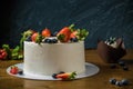 Delicious cakes with cream and berries Royalty Free Stock Photo