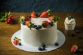 Delicious cakes with cream and berries Royalty Free Stock Photo