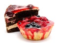 Delicious cakes pastry with fruit cherry raspberry currant isolated