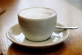 Delicious cappuccino cup with soft focus