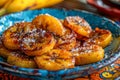 Delicious Caramelized Bananas with Sugar Sprinkle on Colorful Plate, Tropical Dessert Concept Royalty Free Stock Photo