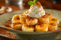 Delicious Caramelized Bananas with Whipped Cream and Mint Leaf Served on Ceramic Plate, Dessert Presentation Royalty Free Stock Photo