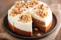 Delicious carrot or spice cake topped with creamy cheese frosting.